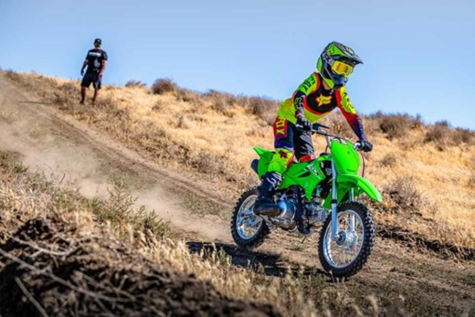 Child on Kawasaki KLX110R kids motorbike